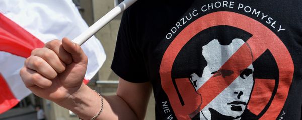 A participant in a march in memory of the Volhynia massacre victims, in Przemysl. A participant in a march in memory of the Volhynia massacre victims, in Przemysl. - Sputnik International
