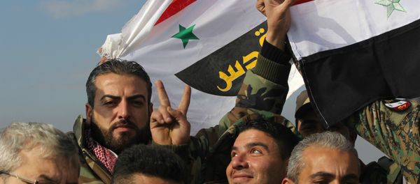 Syrian Arab Army celebrating victory in Sheikh Saeed, East Aleppo. Syrian Arab Army celebrating victory in Sheikh Saeed, East Aleppo. - Sputnik International