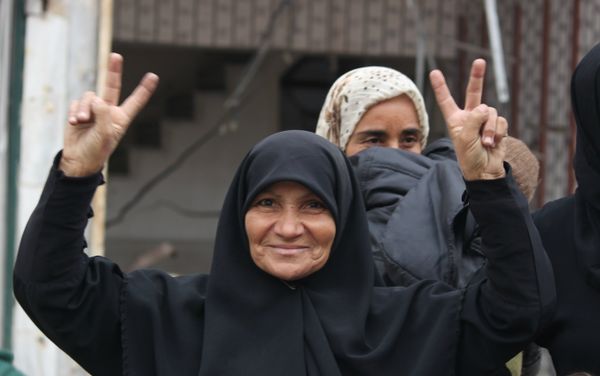 Woman in Hanano, East Aleppo celebrates the SAA liberation of the district from Nusra Front occupation Woman in Hanano, East Aleppo celebrates the SAA liberation of the district from Nusra Front occupation - Sputnik International