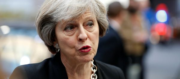 Britain's Prime Minister Theresa May arrives at a European Union leaders summit in Brussels, Belgium December 15, 2016. Britain's Prime Minister Theresa May arrives at a European Union leaders summit in Brussels, Belgium December 15, 2016. - Sputnik International