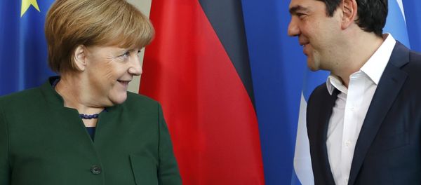 German Chancellor Angela Merkel and Greek Prime Minister Alexis Tsipras (R) leave after a statement at the chancellery in Berlin, Germany, December 16, 2016. German Chancellor Angela Merkel and Greek Prime Minister Alexis Tsipras (R) leave after a statement at the chancellery in Berlin, Germany, December 16, 2016. - Sputnik International