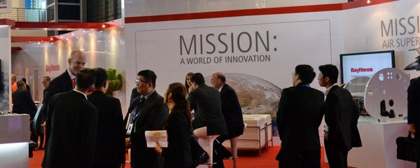 Trade visitors stand in front of a Raytheon booth during the Singapore Air Show. (File) Trade visitors stand in front of a Raytheon booth during the Singapore Air Show. (File) - Sputnik International