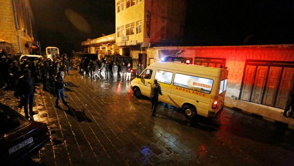 Jordanian policemen and an ambulance are seen in the vicinity of Karak Castle in the city of Karak, Jordan, December 18, 2016 - Sputnik International