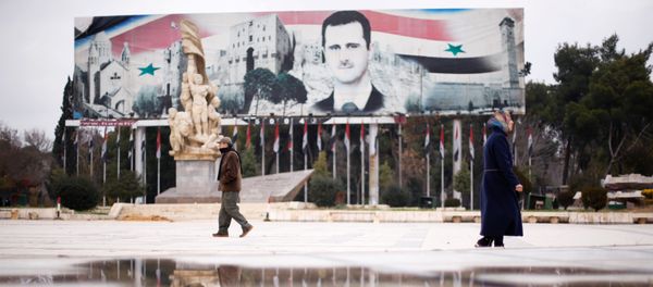 People walk past a billboard depicting Syria's President Bashar al-Assad at Saadallah al-Jabri Square, in the government controlled area of Aleppo, Syria December 17, 2016 People walk past a billboard depicting Syria's President Bashar al-Assad at Saadallah al-Jabri Square, in the government controlled area of Aleppo, Syria December 17, 2016 - Sputnik International