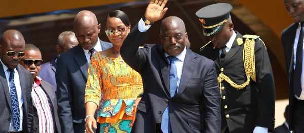 Congolese President Joseph Kabila, center, waves as he and others celebrate the Democratic Republic of Congo, DRC, independence in Kindu, Congo, Thursday, June 30, 2016. Congo's president says nothing can stop long-awaited elections from taking place even as fears mount of a possible delay. Congolese President Joseph Kabila, center, waves as he and others celebrate the Democratic Republic of Congo, DRC, independence in Kindu, Congo, Thursday, June 30, 2016. Congo's president says nothing can stop long-awaited elections from taking place even as fears mount of a possible delay. - Sputnik International