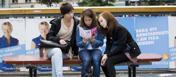 Three young swedish girls read an election bulletin of the Feminist Initiative party Three young swedish girls read an election bulletin of the Feminist Initiative party - Sputnik International