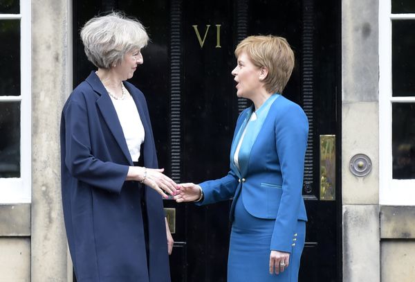 Britain's Prime Minister Theresa May (L) is greeted by Scotland's First Minister Nicola Sturgeon (R) as she arrives for talks at Bute House, in Edinburgh, on July 15, 2016. Britain's Prime Minister Theresa May (L) is greeted by Scotland's First Minister Nicola Sturgeon (R) as she arrives for talks at Bute House, in Edinburgh, on July 15, 2016. - Sputnik International
