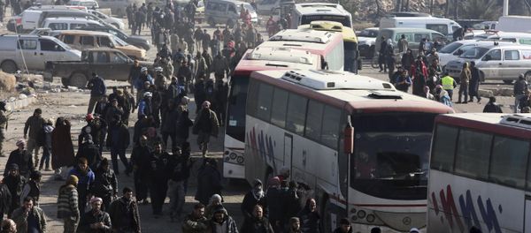 Syrians evacuated from the embattled Syrian city of Aleppo during the ceasefire arrive at a refugee camp in Rashidin, near Idlib, Syria, early Monday, Dec. 19, 2016 Syrians evacuated from the embattled Syrian city of Aleppo during the ceasefire arrive at a refugee camp in Rashidin, near Idlib, Syria, early Monday, Dec. 19, 2016 - Sputnik International
