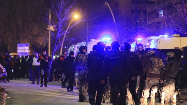 Turkish police officers secure the area close to a photo gallery where the Russian Ambassador to Turkey, Andrei Karlov, was shot by a gunman in Ankara, Turkey. - Sputnik International