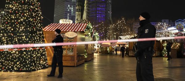 Police guard a Christmas market after a truck ran into the crowded Christmas market in Berlin, Germany. Police guard a Christmas market after a truck ran into the crowded Christmas market in Berlin, Germany. - Sputnik International