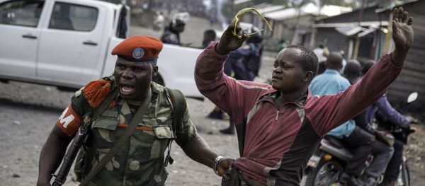 A man is arrested by a member of the military police after people attempted to block the road with rocks, in the neighbourhood of Majengo in Goma, eastern Democratic Republic of the Congo, on 19 December, 2016, as tensions rose with one day left of Congolese President's mandate A man is arrested by a member of the military police after people attempted to block the road with rocks, in the neighbourhood of Majengo in Goma, eastern Democratic Republic of the Congo, on 19 December, 2016, as tensions rose with one day left of Congolese President's mandate - Sputnik International