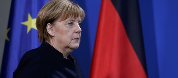 German Chancellor Angela Merkel arrives for a news conference in Berlin, Germany, December 20, 2016, one day after a truck ploughed into a crowded Christmas market in the German capital. German Chancellor Angela Merkel arrives for a news conference in Berlin, Germany, December 20, 2016, one day after a truck ploughed into a crowded Christmas market in the German capital. - Sputnik International