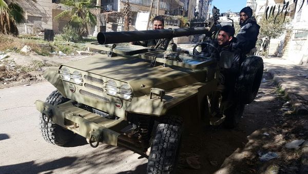 Soldiers in a liberated neighborhood of eastern Aleppo, Syria Soldiers in a liberated neighborhood of eastern Aleppo, Syria - Sputnik International