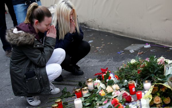 Women mourn at the scene where a truck ploughed into a crowded Christmas market in the German capital last night in Berlin, Germany, December 20, 2016 Women mourn at the scene where a truck ploughed into a crowded Christmas market in the German capital last night in Berlin, Germany, December 20, 2016 - Sputnik International