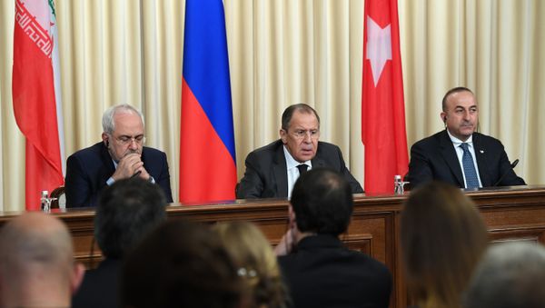 Iranian Foreign Minister Mohammad Javad Zarif, Russian Foreign Minister Sergei Lavrov and Turkish Foreign Minister Mevlut Cavusoglu attend a press conference in Moscow on December 20, 2016 Iranian Foreign Minister Mohammad Javad Zarif, Russian Foreign Minister Sergei Lavrov and Turkish Foreign Minister Mevlut Cavusoglu attend a press conference in Moscow on December 20, 2016 - Sputnik International
