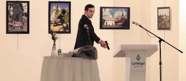 An unnamed gunman shouts after shooting the Russian Ambassador to Turkey, Andrei Karlov, at a photo gallery in Ankara, Turkey, Monday, Dec. 19, 2016 An unnamed gunman shouts after shooting the Russian Ambassador to Turkey, Andrei Karlov, at a photo gallery in Ankara, Turkey, Monday, Dec. 19, 2016 - Sputnik International
