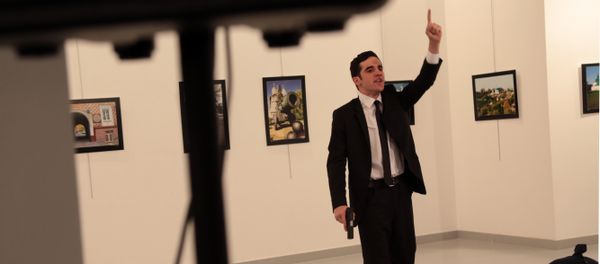 A man gestures near to Andrei Karlov on ground, the Russian Ambassador to Turkey at a photo gallery in Ankara, Turkey, Monday, Dec. 19, 2016 A man gestures near to Andrei Karlov on ground, the Russian Ambassador to Turkey at a photo gallery in Ankara, Turkey, Monday, Dec. 19, 2016 - Sputnik International