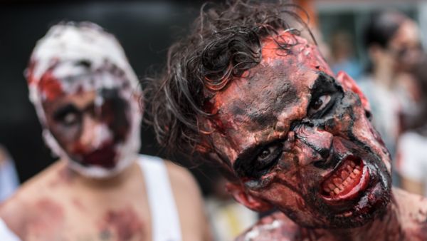A man takes part in a Zombie Walk on the Day of the Dead along Copacabana beach in Rio de Janeiro, Brazil, on November 2, 2015 - Sputnik International