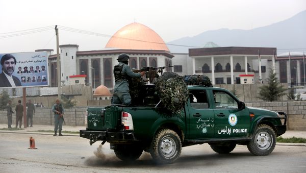 Afghan policemen stand alert in front of the new parliament building after a rocket attack in Kabul, Afghanistan (File) Afghan policemen stand alert in front of the new parliament building after a rocket attack in Kabul, Afghanistan (File) - Sputnik International