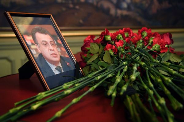 Flowers are placed in front of a portrait of Russian Ambassador to Turkey Andrei Karlov in the Foreign Ministry in Moscow a day after the assassination of the Russian ambassador in the Turkish capital Flowers are placed in front of a portrait of Russian Ambassador to Turkey Andrei Karlov in the Foreign Ministry in Moscow a day after the assassination of the Russian ambassador in the Turkish capital - Sputnik International