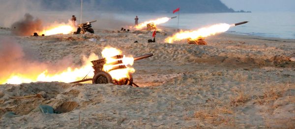 A view of a firing contest among multiple launch rocket system (MLRS) batteries selected from large combined units of the KPA, in this undated photo released by North Korea's Korean Central News Agency (KCNA) in Pyongyang A view of a firing contest among multiple launch rocket system (MLRS) batteries selected from large combined units of the KPA, in this undated photo released by North Korea's Korean Central News Agency (KCNA) in Pyongyang - Sputnik International