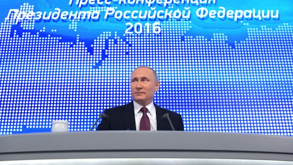 Russian President Vladimir Putin attends his annual end-of-year news conference in Moscow, Russia - Sputnik International
