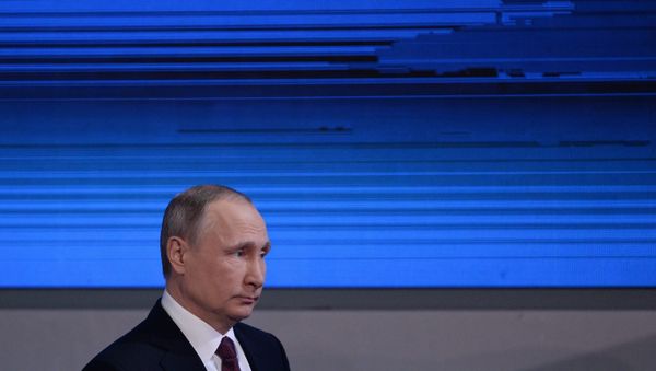 Russian President Vladimir Putin attends his annual end-of-year news conference in Moscow, Russia - Sputnik International