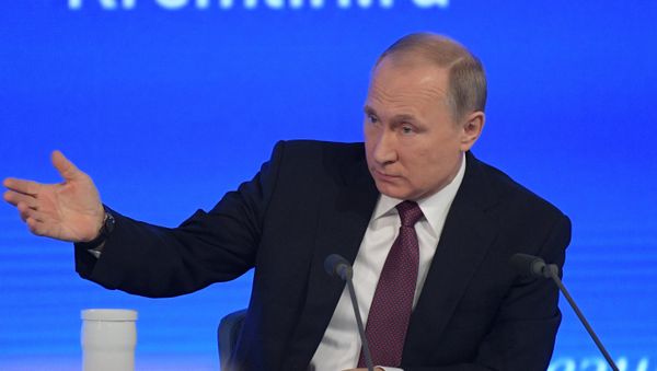 Russian President Vladimir Putin attends his annual end-of-year news conference in Moscow, Russia - Sputnik International