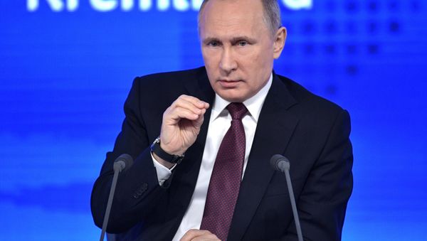 Russian President Vladimir Putin attends his annual end-of-year news conference in Moscow, Russia - Sputnik International