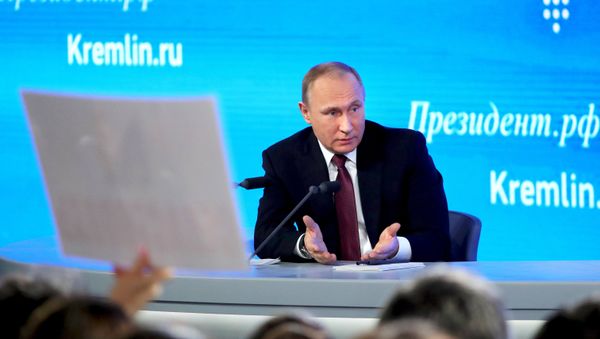 Russian President Vladimir Putin attends his annual end-of-year news conference in Moscow, Russia - Sputnik International