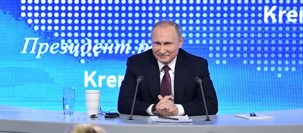 President Vladimir Putin during his twelfth annual news conference at Moscow's World Trade Center in Krasnaya Presnya President Vladimir Putin during his twelfth annual news conference at Moscow's World Trade Center in Krasnaya Presnya - Sputnik International