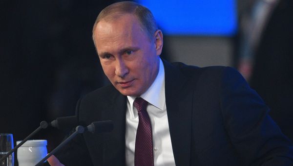 Russian President Vladimir Putin attends his annual end-of-year news conference in Moscow, Russia Russian President Vladimir Putin attends his annual end-of-year news conference in Moscow, Russia - Sputnik International