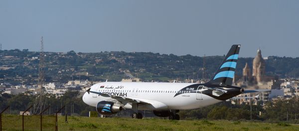 Hijacked Airbus A320 operated by Afriqiyah Airways after it landed at Luqa Airport, in Malta - Sputnik International