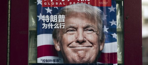 Magazine featuring US President-elect Donald Trump on the cover at a news stand in Shanghai Magazine featuring US President-elect Donald Trump on the cover at a news stand in Shanghai - Sputnik International