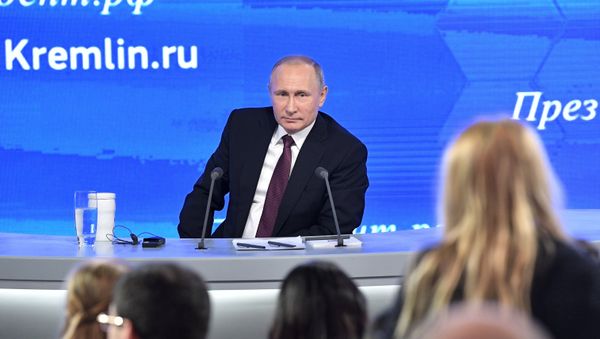 Russian President Vladimir Putin during his 12th annual news conference at Moscow's World Trade Center in Krasnaya Presnya Russian President Vladimir Putin during his 12th annual news conference at Moscow's World Trade Center in Krasnaya Presnya - Sputnik International