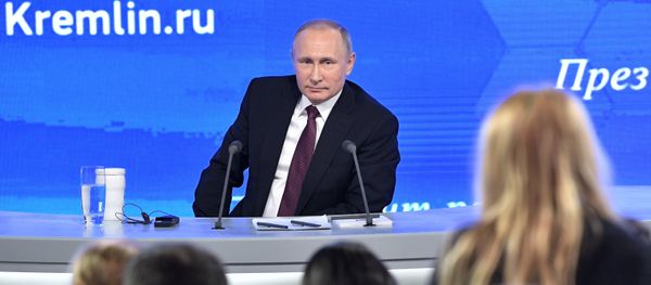 Russian President Vladimir Putin during his 12th annual news conference at Moscow's World Trade Center in Krasnaya Presnya Russian President Vladimir Putin during his 12th annual news conference at Moscow's World Trade Center in Krasnaya Presnya - Sputnik International
