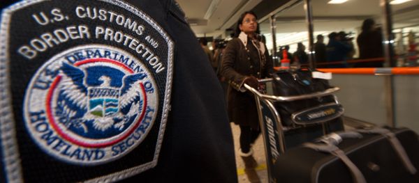 An international air traveler clears US Customs and Border Protection declarations to enter the United States An international air traveler clears US Customs and Border Protection declarations to enter the United States - Sputnik International