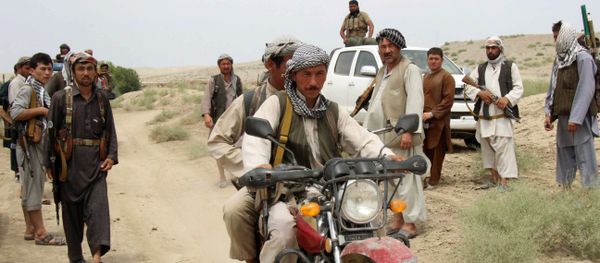 This photograph taken on August 1, 2015, shows members of Afghanistan's militia forces gathering in the Qala-e Zal district of Kunduz province - Sputnik International