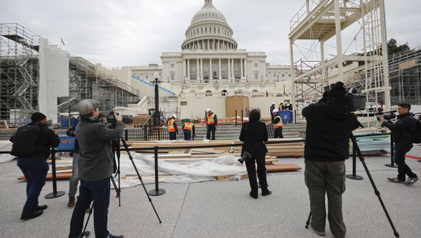 Members of the media document workers on Capitol Hill in Washington, Thursday, Dec. 8, 2016, as construction continues on the Inaugural platform in preparation for the Inauguration and swearing-in ceremonies for President-elect Donald Trump - Sputnik International