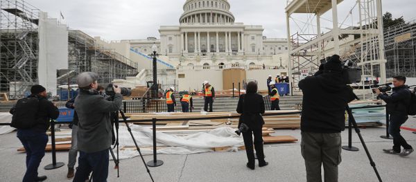 Members of the media document workers on Capitol Hill in Washington, Thursday, Dec. 8, 2016, as construction continues on the Inaugural platform in preparation for the Inauguration and swearing-in ceremonies for President-elect Donald Trump Members of the media document workers on Capitol Hill in Washington, Thursday, Dec. 8, 2016, as construction continues on the Inaugural platform in preparation for the Inauguration and swearing-in ceremonies for President-elect Donald Trump - Sputnik International