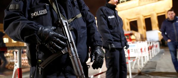 German police provide security at the Brandenburg Gate, ahead of the upcoming New Year's Eve celebrations in Berlin, Germany December 27, 2016 German police provide security at the Brandenburg Gate, ahead of the upcoming New Year's Eve celebrations in Berlin, Germany December 27, 2016 - Sputnik International