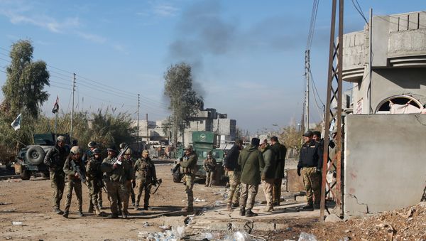 Iraqi rapid response forces gather during a fight with Islamic State militants in Intisar district of eastern Mosul, Iraq, December 22, 2016 - Sputnik International