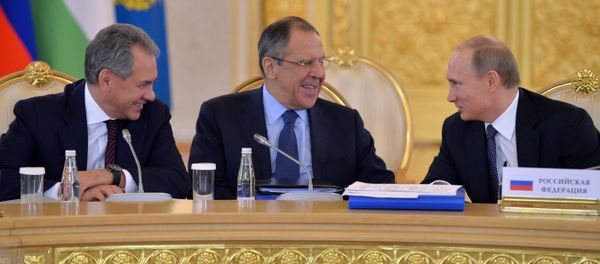 From right: Russia's President Vladimir Putin, Foreign Minister Sergei Lavrov and defense Minister Sergei Shoigu. File photo - Sputnik International