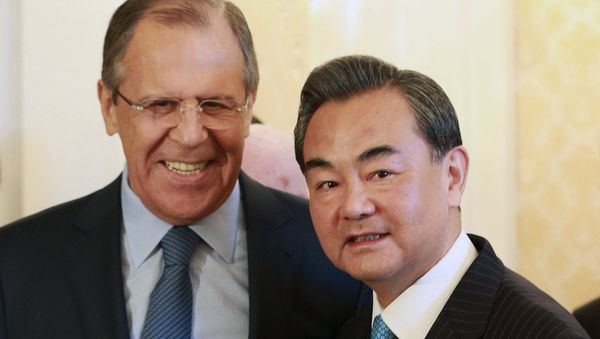 Russian FM Sergey Lavrov meets Chinese FM Wang Yi Russian FM Sergey Lavrov meets Chinese FM Wang Yi - Sputnik International