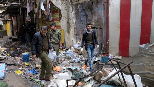 Iraqi security forces gather at the site of a bomb attack at a market in central Baghdad, Iraq December 31, 2016 Iraqi security forces gather at the site of a bomb attack at a market in central Baghdad, Iraq December 31, 2016 - Sputnik International