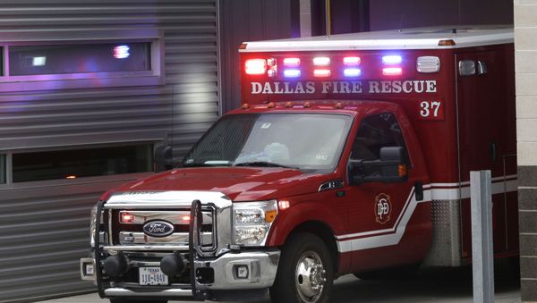 An ambulance pulls into the Dallas Fire-Rescue station 37 in Dallas, Wednesday, Oct. 1, 2014 An ambulance pulls into the Dallas Fire-Rescue station 37 in Dallas, Wednesday, Oct. 1, 2014 - Sputnik International