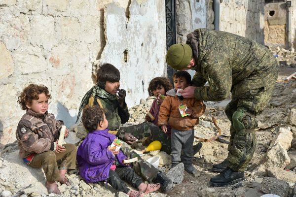Military engineers of the Russian Army's international counter-mine center are seen in an Aleppo street with children. File photo Military engineers of the Russian Army's international counter-mine center are seen in an Aleppo street with children. File photo - Sputnik International