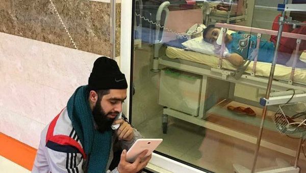 An Iranian teacher visiting his student at hospital. file photo An Iranian teacher visiting his student at hospital. file photo - Sputnik International
