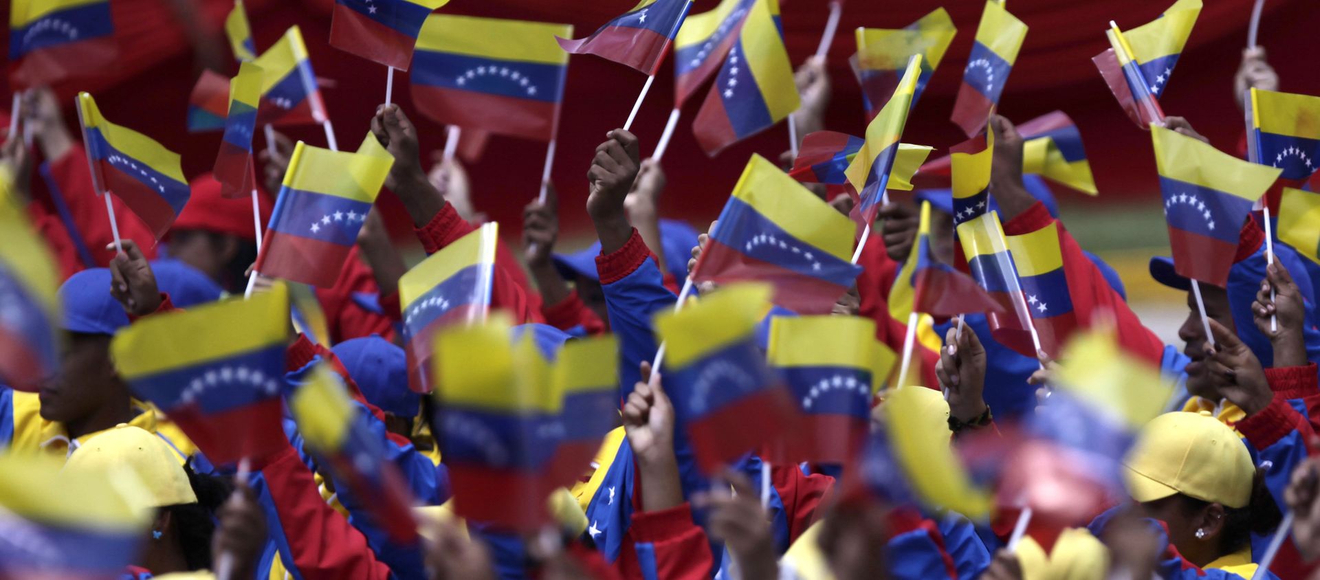 People wave Venezuelan flags during a parade marking 200 years of Venezuela's independence in Caracas, Venezuela, Tuesday July 5, 2011. People wave Venezuelan flags during a parade marking 200 years of Venezuela's independence in Caracas, Venezuela, Tuesday July 5, 2011. - Sputnik International, 1920, 04.05.2021