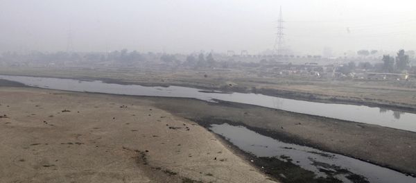 Very little water flows in the Ravi River in Lahore, Pakistan, Wednesday, Dec. 14, 2016. Under the Indus Water Treaty, India has exclusive rights to three Indus basin rivers, including the Ravi, which has virtually disappeared on the Pakistani side Very little water flows in the Ravi River in Lahore, Pakistan, Wednesday, Dec. 14, 2016. Under the Indus Water Treaty, India has exclusive rights to three Indus basin rivers, including the Ravi, which has virtually disappeared on the Pakistani side - Sputnik International